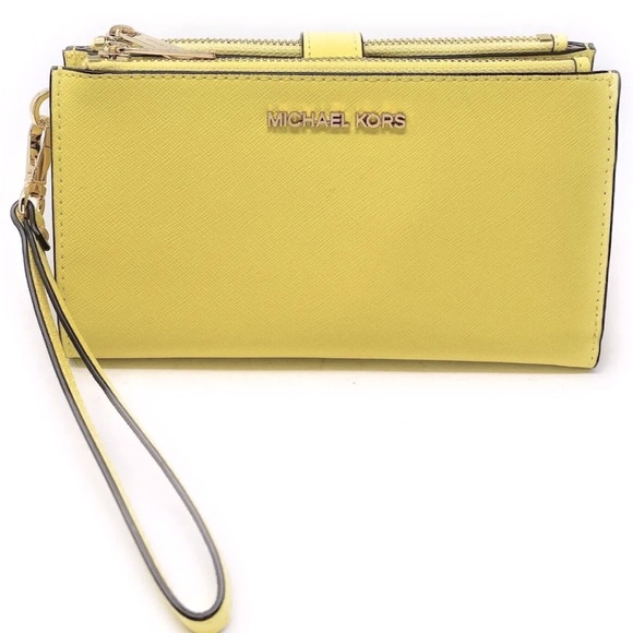 Michael Kors Handbags - Michael Kors Jet Set Travel Lg Double Zip Wristlet Leather Wallet sunshine ⭐️